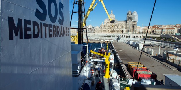 A picture taken on February 19, 2016, in Marseille shows the Aquarius vessel before the departure on its new mission of Non Governmental Organisation (NGO) Medecins du Monde in partnership with the NGO SOS Mediteranee.The Aquarius vessel leased by Medecins du Monde (Doctors of the World) and SOS Mediterranee will leave Marseille's harbour for its first mission on February 20, 2016 to rescue migrants that sink in the middle of the Mediterranean sea as they try to reach Europe. / AFP / BERTRAND LA
