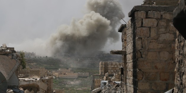 ALEPPO, SYRIA - APRIL 8 : Smoke rises after Russian air-strikes hit opposition controlled areas as clashes between Syrian oppositions and regime forces continue at Handarat region of Aleppo, Syria on April 8, 2016. (Photo by Beha el Halebi/Anadolu Agency/Getty Images)