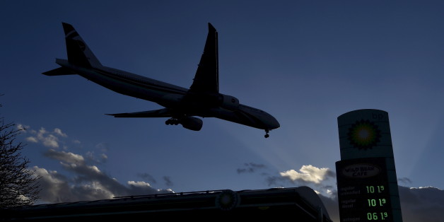 A BP gas station is seen as a plane files overhead in London, Britain in this January 30, 2016 file photo. REUTERS/Toby Melville