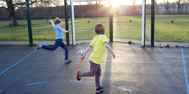 Boys playing football