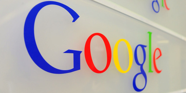 Google logo is seen on a wall at the entrance of the Google offices in Brussels on February 5, 2014. The European Commission accepted the latest proposals by US giant Google to remedy complaints it abuses its dominant position in the Internet search market, opening the way to a settlement.'I believe that the new proposal obtained from Google after long and difficult talks can now address the Commission's concerns,' Almunia said AFP PHOTO GEORGES GOBET (Photo credit should read GEORGES GOBET/AFP/Getty Images)