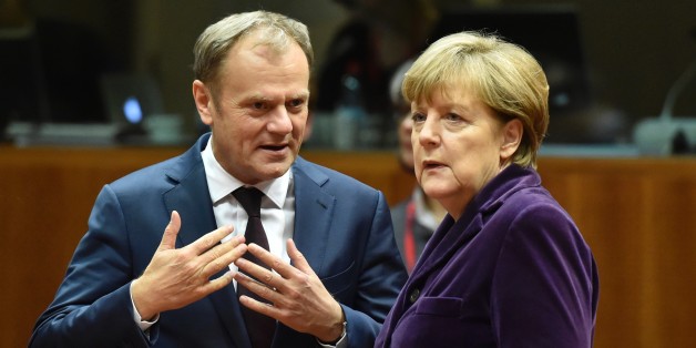 European Council president Donald Tusk (L) speaks with German Chancellor Angela Merkel before the final European Union (EU) summit of the year at the European Council in Brussels on December 17, 2015.
EU leaders will discuss British Prime Minister David Cameron's controversial reform demands as well as plans for a new European border force to deal with the migration crisis. / AFP / ALAIN JOCARD (Photo credit should read ALAIN JOCARD/AFP/Getty Images)