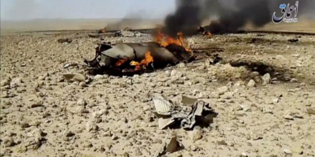 A view of the burning wreckage of a plane that crashed southeast of Damascus, Syria in this still image taken from video said to be shot April 22, 2016. The video was shared online by Islamic State-affiliated news agency Amaq. Reuters could not independently verify the video. Social Media Website via Reuters TV ATTENTION EDITORS - THIS IMAGE WAS PROVIDED BY A THIRD PARTY. EDITORIAL USE ONLY. NO RESALES. NO ARCHIVE.