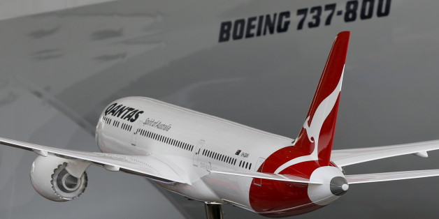 A model of a Boeing 787-9 Dreamliner in Qantas livery is shown during an event marking the 95th anniversary of the Airline at the Qantas Hangar at Sydney International Airport, November 16, 2015. REUTERS/Jason Reed