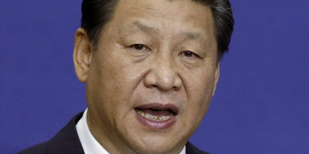 Chinese President Xi Jinping delivers a speech to students and audience during the lecture at Seoul National University in Seoul, South Korea, Friday, July 4, 2014. With a single meeting Thursday, the leaders of China and South Korea simultaneously snubbed North Korea, bolstered their already booming trade relationship and gave the U.S. and Japan a look at Beijing's growing influence south of the Korean Demilitarized Zone. (AP Photo/Lee Jin-man)