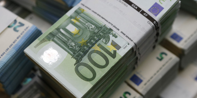 Wads of euro banknotes are stacked in a pile at the Money Service Austria company's headquarters in Vienna, Austria, March 3, 2016. REUTERS/Leonhard Foeger