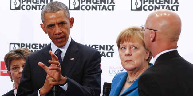 U.S. President Barack Obama speaks as German Chancellor Angela Merkel and Phoenix Contact President Jack Nehlig (R) listen during the opening tour of the Hannover Messe in Hanover, Germany April 25, 2016. REUTERS/Kai Pfaffenbach