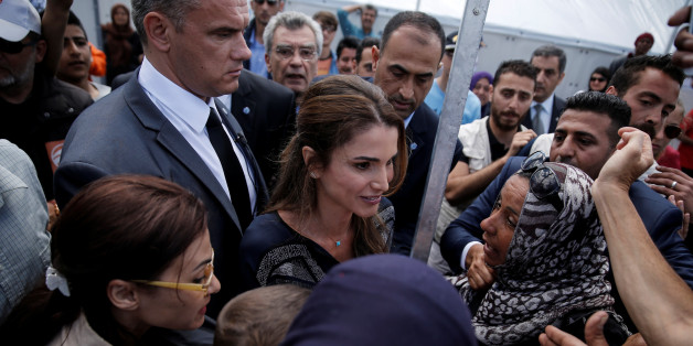 Queen Rania of Jordan (C) is welcomed by refugees and migrants during her visit at the Kara Tepe refugee camp on the island of Lesbos, Greece April 25, 2016. REUTERS/Alkis Konstantinidis