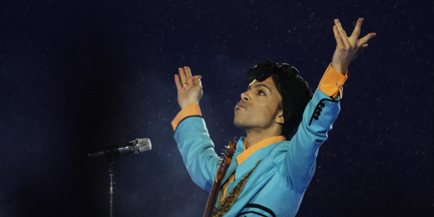 FILE- In this Feb. 4, 2007, file photo, Prince performs during the halftime show at Super Bowl XLI at Dolphin Stadium in Miami. In an industry where collaborations with other artists and credits are negotiated as heavily as world treaties, Prince followed only one credo when it came to working with others: the love of the music. Prince died Thursday, April 21, 2016, at his home outside Minneapolis. (AP Photo/Alex Brandon, File)