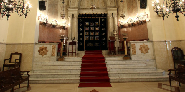 An inside view of the synagogue in Marseille, southern France, Wednesday, Jan. 13, 2016. A leading Jewish authority in Marseille asked fellow Jews on Tuesday to refrain from wearing their traditional skull cap to stay safe after a machete-wielding teen attacked a Jewish teacher. (AP Photo/Claude Paris)