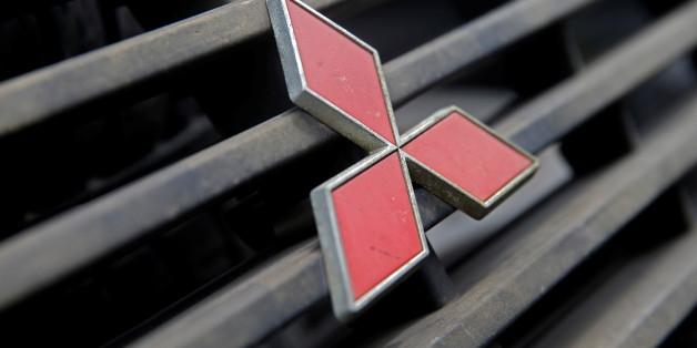 Mitsubishi logo are seen on the hood mask in this picture illustration taken, April 23, 2016. REUTERS/Dado Ruvic