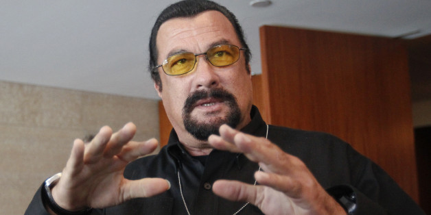 U.S. actor Steven Seagal speaks to the media at a news conference in Moscow June 2, 2013. U.S. lawmakers on a mission to Russia said on Sunday they had found no evidence that an American intelligence error enabled the Boston bombings, but that closer cooperation between Washington and Moscow might have helped to thwart the attack, in which three people died and 264 were injured. REUTERS/Maxim Shemetov (RUSSIA - Tags: POLITICS CIVIL UNREST CRIME LAW ENTERTAINMENT)