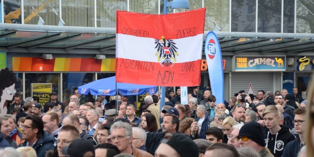 VIENNA, AUSTRIA APRIL 18 : Anti-refugee far right Freedom Party of Austria (FPO) and Pro-refugee 'Platform for a humane asylum policy' group stage rival protests in Vienna, Austria on April 18, 2016. (Photo by Hasan Tosun/Anadolu Agency/Getty Images)