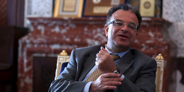 Tunisia's Finance Minister Slim Chaker gestures as he speaks with Reuters journalists in Tunis, Tunisia, October 26, 2015. Tunisia, frustrated by the international community's failure to deliver on pledges of economic support, is asking the Group of Eight major nations for a five-year rescue programme worth $25 billion. Chaker told a Reuters the billions of dollars of aid were needed to ensure Tunisia's political progress was not reversed. Picture taken October 26, 2015. REUTERS/Zoubeir Souissi