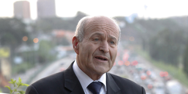 Issad Rebrab, president and owner of Algerian food processing company Cevital, speaks during an interview with Reuters in Abidjan June 8, 2012. Cevital plans to make investments in Ivory Coast in rice growing and cocoa processing as a first big step in a plan to expand abroad, Rebrab said. Picture taken June 8, 2012. To match Interview IVORYCOAST-AGRICULTURE/CEVITAL REUTERS/Thierry Gouegnon (IVORY COAST - Tags: BUSINESS AGRICULTURE)