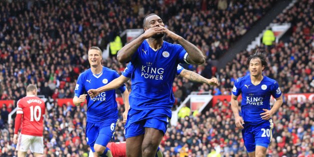 Leicester's Wes Morgan, centre, celebrates after scoring during the English Premier League soccer match between Manchester United and Leicester at Old Trafford Stadium, Manchester, England, Sunday, May 1, 2016. (AP Photo/Jon Super)
