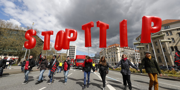 Protesters demonstrate against Transatlantic Trade and Investment Partnership (TTIP) free trade agreement ahead of U.S. President Barack Obama's visit in Hannover, Germany April 23, 2016. REUTERS/Kai Pfaffenbach