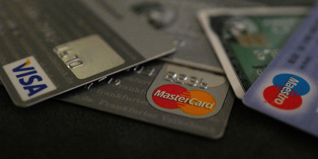 Bank debit and credit cards are photographed in this illustration picture at an office in Frankfurt, Germany, March 17, 2016. REUTERS/Kai Pfaffenbach