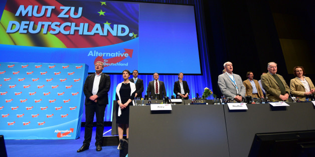 STUTTGART, GERMANY - MAY 01: Frauke Petry (2-L), head of the Alternative fuer Deutschland (AfD) political party, and the party board sing the German national anthem at the end of the party's federal congress on May 01, 2016 in Stuttgart, Germany. A server of the party had been hacked by a left political group and the addresses of AfD members has been published. The AfD, a relative newcomer to the German political landscape, has emerged from Euro-sceptic conservatism towards a more right-wing le