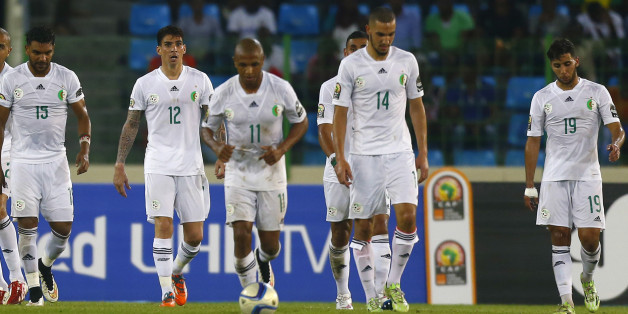 Algeria players react after a goal by Ivory Coast's Wilfried Bony (unseen) during their quarter-final soccer match of the 2015 African Cup of Nations in Malabo February 1, 2015. REUTERS/Amr Abdallah Dalsh (EQUATORIAL GUINEA - Tags: SPORT SOCCER)