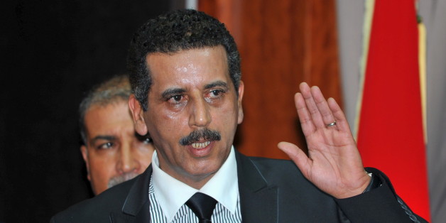 Morocco's Central Bureau of Judicial Investigation (BCIJ) chief Abdelhak Khayyam speaks to the media during a news conference at the BCIJ office in Sale March 23, 2015. Moroccan authorities said on Monday they had dismantled a militant cell planning to create an Islamic State affiliate in the North African kingdom, seizing guns and accusing its members of plotting attacks. Reporters were shown six pistols and ammunition seized from a hideout near the southern city of Agadir, in the offices of th