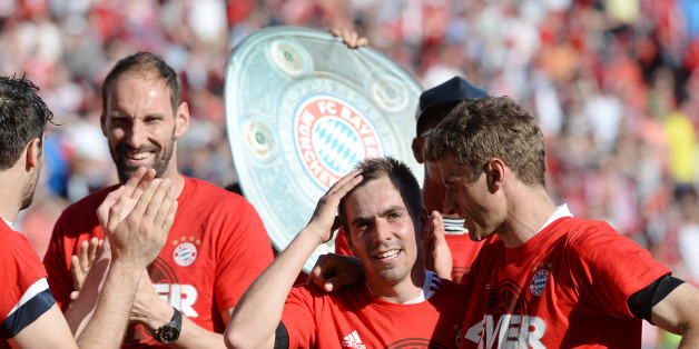 Tom Starke zusammen mit Kapitän Lahm und Thomas Müller