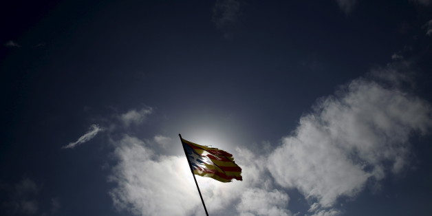 An "estelada" (Catalan separatist flag) hangs from a pole in Cabrera de Mar, north of Barcelona, Spain, February 14, 2016. The question of Catalonia and its surging separatist movement has become pivotal as Spain's political leaders try to thrash out a pact on a government after the most fragmented national election in decades. Picture taken February 14, 2016. To match Insight SPAIN-CATALONIA/ REUTERS/Albert Gea