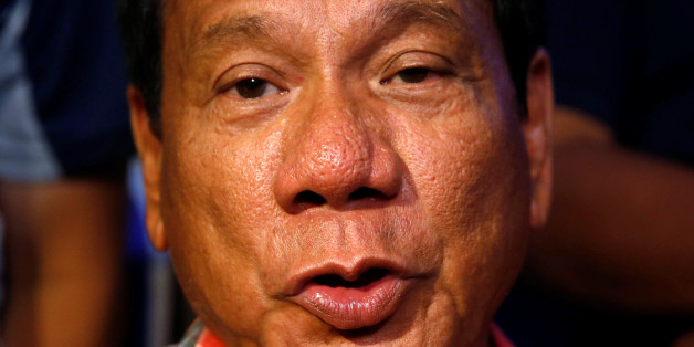 Presidential candidate Rodrigo "Digong" Duterte talks to reporters in Davao city in southern Philippines, May 9, 2016. REUTERS/Erik De Castro