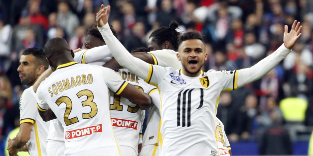 Football soccer - Paris St Germain v Lille - French League Cup final - Stade de France stadium, Saint-Denis, France 23/04/2016 - Lille's Sofiane Boufal (R) reacts after team mate Djibril Sidibe scored during their French League Cup final soccer match REUTERS/Jacky Naegelen