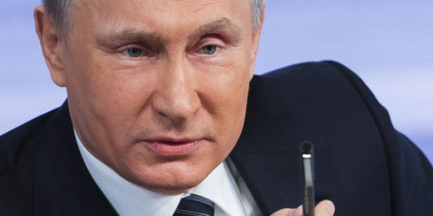 FILE - In this Thursday, Dec. 17, 2015 file photo, Russian President Vladimir Putin speaks during his annual end of year news conference in Moscow, Russia. Putin says that Russia's economy is showing signs of stabilization despite plummeting oil prices. If the year that was turned out to be daunting, 2016 is shaping up as the European Unionâs year of living dangerously. (AP Photo/Alexander Zemlianichenko, File)
