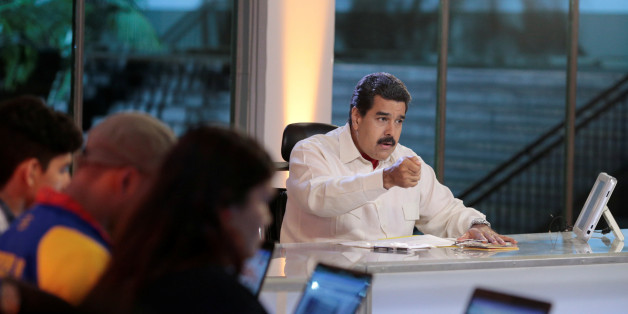 Venezuela's President Nicolas Maduro (C) speaks during his weekly broadcast "En contacto con Maduro" (In contact with Maduro) at the Miraflores Palace in Caracas, Venezuela, May 10, 2016, in this handout photo provided by Miraflores Palace. Miraflores Palace/Handout via REUTERS ATTENTION EDITORS - THIS PICTURE WAS PROVIDED BY A THIRD PARTY. EDITORIAL USE ONLY.