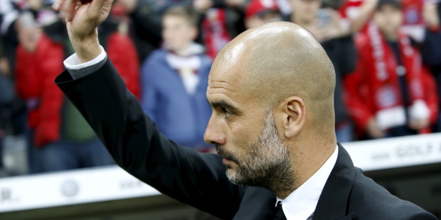 Football Soccer - Bayern Munich v Werder Bremen - German Cup (DFB Pokal) - Allianz Arena, Munich, Germany - 19/04/16 Bayern Munich's coach Pep Guardiola gestures before soccer match. REUTERS/Michaela Rehle DFB RULES PROHIBIT USE IN MMS SERVICES VIA HANDHELD DEVICES UNTIL TWO HOURS AFTER A MATCH AND ANY USAGE ON INTERNET OR ONLINE MEDIA SIMULATING VIDEO FOOTAGE DURING THE MATCH.