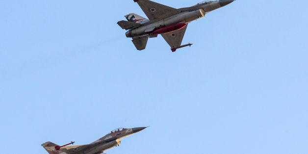 Israeli F-16 fighter jets perform during a graduation ceremony at the Hatzerim base in the Negev desert, near the southern Israeli city of Beersheva, on December 31, 2015. AFP PHOTO / JACK GUEZ / AFP / JACK GUEZ (Photo credit should read JACK GUEZ/AFP/Getty Images)