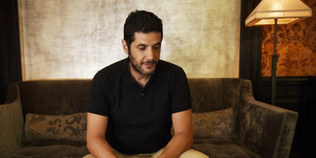 French-Moroccan film director Nabil Ayouch poses on June 19, 2015 in Paris. His last movie 'Much Loved', which follows the life of prostitutes, was banned and censored by the government in Morocco. AFP PHOTO / LOIC VENANCE (Photo credit should read LOIC VENANCE/AFP/Getty Images)