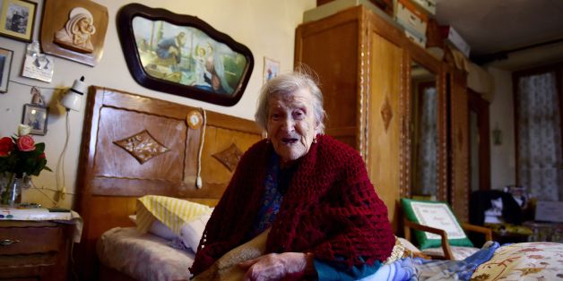 Emma Morano, 116, holds a pillow reading '116 years old, Happy Birthday Emma' as she poses for AFP photographer in Verbania, North Italy, on May 14, 2016. Emma Morano is the oldest living person in the world, and the only one left who has touched three centuries. Susannah Mushatt Jones, a New York woman several months her senior, died on May 12 evening, making Morano the world's oldest known person at 116. / AFP / OLIVIER MORIN (Photo credit should read OLIVIER MORIN/AFP/Getty Images)