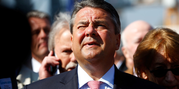 German Vice Chancellor and Economy Minister Sigmar Gabriel reacts during his visit at the 'Bauma' Trade Fair for Construction, Building Material and Mining Machines and Construction Vehicles and Equipment in Munich, southern Germany, April 11, 2016. REUTERS/Michael Dalder