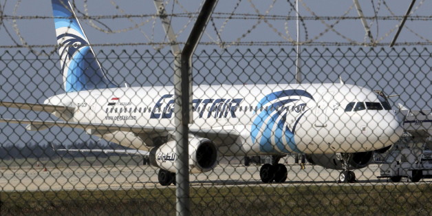 A hijacked Egyptair Airbus A320 airbus stands on the runway at Larnaca Airport in Larnaca, Cyprus , March 29, 2016. REUTERS/Yiannis Kourtoglou TPX IMAGES OF THE DAY