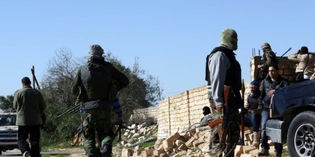 Des membres des forces du gouvernement, le 21 janvier 2014 dans la banlieue de Tripoli © AFP/Archives