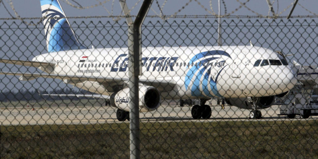 FILE PHOTO - An Egyptair Airbus A320 airbus stands on the runway at Larnaca Airport in Larnaca, Cyprus , March 29, 2016. REUTERS/Yiannis Kourtoglou /File Photo