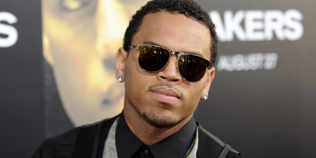 Actor and singer Chris Brown arrives at the premiere of "Takers" in Los Angeles, California August 4, 2010. REUTERS/Gus Ruelas (UNITED STATES - Tags: ENTERTAINMENT PROFILE)