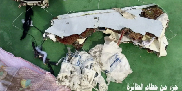 Recovered debris of the EgyptAir jet that crashed in the Mediterranean Sea is seen with the Arabic caption "part of plane wreckage" in this still image taken from video on May 21, 2016. Egyptian Military/Handout via Reuters TV ATTENTION EDITORS - THIS IMAGE WAS PROVIDED BY A THIRD PARTY. EDITORIAL USE ONLY. NO RESALES. NO ARCHIVE.