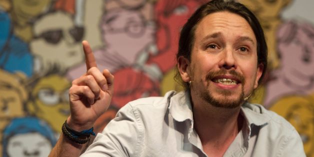 Leader of left wing party Podemos Pablo Iglesias speaks during 'The Congress on your Square' meeting held at El Pozo cultural center in Vallecas, a neighborhood of Madrid on May 11, 2016. / AFP / CURTO DE LA TORRE (Photo credit should read CURTO DE LA TORRE/AFP/Getty Images)
