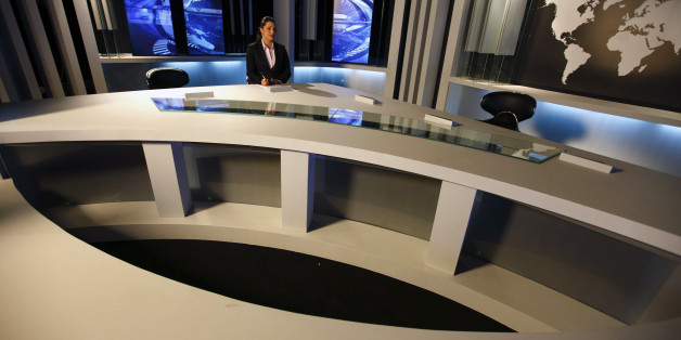 Nourelyakin Meghrich, an Ennahar TV News anchorwoman is seen at a TV news studio in Algier May 8, 2012. In the past few months, several independent Algerian television channels have started broadcasting, undermining the monopoly of state television. The new stations were set up after President Abdelaziz Bouteflika, under pressure to reform after the ?Arab Spring? uprisings in neighbouring states, promised to open up the country?s tightly-controlled electronic media. REUTERS/Zohra Bensemra (ALGER