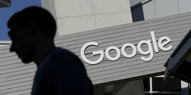 FILE - In this Nov. 12, 2015, file photo, a man walks past a building on the Google campus in Mountain View, Calif. Google said Wednesday, May 11, 2016, that it will ban ads from payday lenders, calling the industry âdeceptiveâ and âharmful.â Google said it will no longer allow ads for loans due within 60 days and will also ban ads for loans where the interest rate is 36 percent or higher. The ban is effective July 13. (AP Photo/Jeff Chiu, File)
