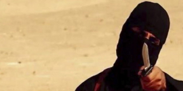 Execution of Steven Sotloff (1983 Â 2014) by Jihadi John of ISIS. In August 2013, Sotloff was kidnapped in Aleppo, Syria, and held captive by militants from the Islamic State of Iraq and the Levant. Jihadi John (Mohammed Emwazi, born August 1988) a British man who is thought to be the person seen in several videos produced by the Islamic extremist group ISIL showing the beheadings of a number of captives in 2014 and 2015. (Photo by Universal History Archive/UIG via Getty Images)