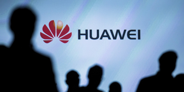 Journalists follow the presentation of Huawei's smartphone, the Mate S, ahead of the IFA Electronics show in Berlin, Germany, in this file picture taken September 2, 2015. REUTERS/Hannibal Hanschke/File Photo