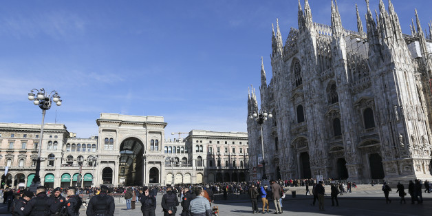 Italian Carabinieri officers stand at the Duomo's square downtown Milan, Italy, February 21, 2016. Picture taken on February 21, 2016. REUTERS/Stefano Rellandini