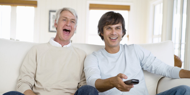 Father and son laughing