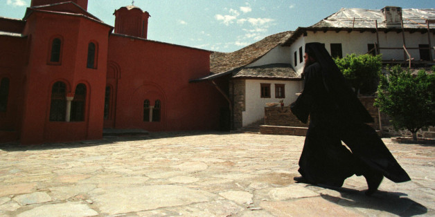 An Orthodox monk walks in courtyard of a monastery of autonomous community of Mount Athos in northern Greece May 10. Portuguese Prime Minister Antonio Guterres visited monasteries of Mount Athos during his semi-official three-day visit to Greece.
YK/GB