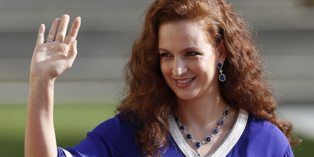 Morocco's Princess Lalla Salma waves as she leaves the religious wedding service of Luxembourg's Hereditary Grand Duke Guillaume and Princess Stephanie, Hereditary Grand Duchess of Luxembourg, at the Cathedral Notre Dame in Luxembourg October 20, 2012. REUTERS/Francois Lenoir (LUXEMBOURG - Tags: ENTERTAINMENT SOCIETY ROYALS)
